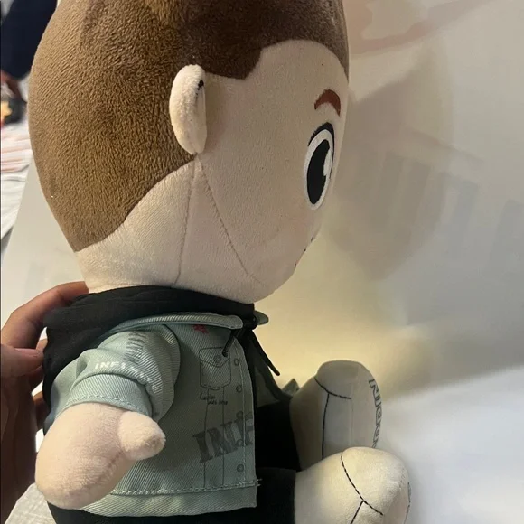 Charming Plush Toy with Brown Hair and Green Jacket - Picture 4 of 5